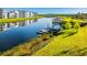 A scenic dock with watercraft is a great place to relax by the lake at 4530 Narrative Ln, Kissimmee, FL 34746