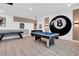 Game room with a pool table, decorative wall art, and pendant lighting at 4530 Narrative Ln, Kissimmee, FL 34746