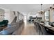 Spacious open-concept living and dining area with modern furnishings and ample natural light at 4530 Narrative Ln, Kissimmee, FL 34746
