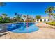 Community splash pad with colorful fountains on a blue rubber surface surrounded by brick pavers at 4530 Narrative Ln, Kissimmee, FL 34746
