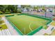 A community sports field with an enclosed green turf, providing a recreational space for residents at 4530 Narrative Ln, Kissimmee, FL 34746
