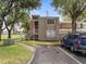 Charming condo featuring a private entrance, well-maintained landscaping, and convenient parking at 5083 Eaglesmere Dr # A12, Orlando, FL 32819