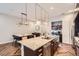 Well-appointed kitchen with a large island, stainless steel appliances, custom cabinets, and a convenient pantry at 524 Lanark Ct, Orlando, FL 32806