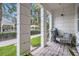 Inviting outdoor patio with a grill, comfortable seating, and a charming brick floor, perfect for entertaining at 524 Lanark Ct, Orlando, FL 32806
