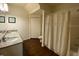 Second bathroom featuring dual sinks, granite countertop, shower and tub at 5370 Diplomat Ct # 107, Kissimmee, FL 34746