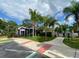 Charming community clubhouse with well-kept landscaping and modern amenities at 5370 Diplomat Ct # 107, Kissimmee, FL 34746