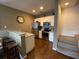 Modern kitchen with stainless steel appliances, bar seating, and ample cabinet space at 5370 Diplomat Ct # 107, Kissimmee, FL 34746