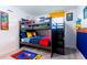 Fun bedroom with a playful bunk bed, colorful decor, and a delightful Mario Brothers theme at 665 Longboat Dr, Davenport, FL 33896