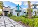 Stylish community building featuring Fitness Center and Arcade, manicured landscaping, and welcoming entryway at 665 Longboat Dr, Davenport, FL 33896
