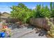 Backyard with a wooden fence features potential for gardening and outdoor enjoyment at 6906 Sawmill Blvd, Ocoee, FL 34761