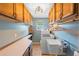 Laundry room includes lots of storage, counter space and a sink at 6906 Sawmill Blvd, Ocoee, FL 34761
