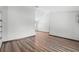 Bright and airy living room with updated hardwood floors and neutral paint, open floor plan at 6906 Sawmill Blvd, Ocoee, FL 34761