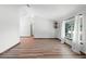 Inviting living room with vaulted ceilings and hardwood floors, illuminated by natural light at 6906 Sawmill Blvd, Ocoee, FL 34761
