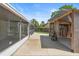 Backyard includes a patio, pergola, and screened-in lanai extending outdoor living space at 6906 Sawmill Blvd, Ocoee, FL 34761