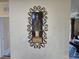 Decorative wall art hanging above a light switch in the home at 8020 Tuscany Way # 6307, Davenport, FL 33896