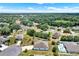 An aerial shot of the neighborhood showcasing community layout, nearby greenery, and residential homes at 804 Glen Creek Ct, Fruitland Park, FL 34731