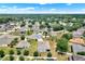 An aerial perspective of the neighborhood, highlighting the lush landscaping and residential layout at 804 Glen Creek Ct, Fruitland Park, FL 34731