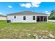 The house offers a well-maintained lawn and a screened-in patio, perfect for enjoying the outdoors at 804 Glen Creek Ct, Fruitland Park, FL 34731