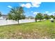 The property is equipped with a well-maintained backyard, surrounded by a secure white fence at 804 Glen Creek Ct, Fruitland Park, FL 34731