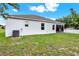 This home features a spacious backyard with a screened-in patio and ample space for outdoor activities at 804 Glen Creek Ct, Fruitland Park, FL 34731