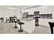Kitchen island with seating, granite countertops, stainless steel appliances, and open concept at 804 Glen Creek Ct, Fruitland Park, FL 34731