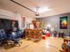 Finished garage space featuring painted flooring and decorated back wall at 8710 Rindge Rd, Polk City, FL 33868