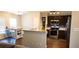 Open concept kitchen showcasing stainless steel appliances, ample counter space, and eat in kitchen table at 8767 Grandee Dr, Orlando, FL 32829