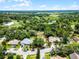 Overhead view showcasing the house, neighborhood and large yard at 891 Licaria Dr, Ocoee, FL 34761