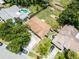 Overhead shot of the property showcasing neighborhood, patio, and driveway at 891 Licaria Dr, Ocoee, FL 34761