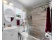 Bathroom featuring tile floors, updated shower, modern fixtures and natural light at 891 Licaria Dr, Ocoee, FL 34761