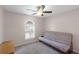 Bedroom featuring carpet floors, window with shutters and a vintage style futon at 891 Licaria Dr, Ocoee, FL 34761