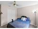 Bedroom featuring carpet floors, ceiling fan, and lots of space to relax at 891 Licaria Dr, Ocoee, FL 34761