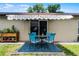 Covered patio with outdoor seating, perfect for relaxing and entertaining at 891 Licaria Dr, Ocoee, FL 34761
