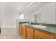 Spacious bathroom featuring a double sink vanity and a large soaking tub at 8920 Palisades Beach Ave, Orlando, FL 32829