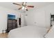 Bedroom featuring a bed, closet and TV at 8920 Palisades Beach Ave, Orlando, FL 32829