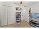 Bedroom showcasing built-in bookcase and closet space at 8920 Palisades Beach Ave, Orlando, FL 32829