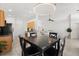 Open concept dining area seamlessly connects to the kitchen and living room, creating an inviting space at 8920 Palisades Beach Ave, Orlando, FL 32829