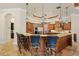 Spacious kitchen with a large island, breakfast bar, and custom cabinets at 9253 Tibet Pointe Cir, Windermere, FL 34786