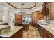 Well-appointed kitchen with stainless steel appliances, custom cabinets, and kitchen island at 9253 Tibet Pointe Cir, Windermere, FL 34786