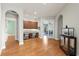 Spacious office area with built-in desks, cabinetry, and hardwood flooring at 9253 Tibet Pointe Cir, Windermere, FL 34786