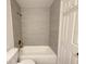 Bathroom featuring shower/tub combination with tiled walls at 947 Bird Bay Ct # 205, Lake Mary, FL 32746