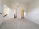 Spacious bedroom with carpet, walk-in closet, and ensuite bathroom access at 947 Bird Bay Ct # 205, Lake Mary, FL 32746