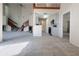 Open floorplan with carpet flooring, fireplace, stairs, and renovated kitchen at 947 Bird Bay Ct # 205, Lake Mary, FL 32746
