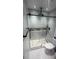 Sleek bathroom featuring a glass shower enclosure and modern fixtures and updated tile at 970 N Spring Garden Ave # 621, Deland, FL 32720
