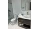 Contemporary bathroom with modern vanity, sleek fixtures, and a glass-enclosed shower at 970 N Spring Garden Ave # 621, Deland, FL 32720