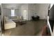 Bright living room featuring neutral decor, a modern sofa, and a glass coffee table at 970 N Spring Garden Ave # 621, Deland, FL 32720