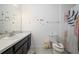 Stylish bathroom with modern decor, vanity, and shower-tub combo at 978 E 10Th St, Apopka, FL 32703