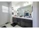Bathroom showcasing a double sink vanity and shower at 978 E 10Th St, Apopka, FL 32703