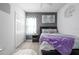 Comfortable bedroom with a ceiling fan, closet, and modern décor at 978 E 10Th St, Apopka, FL 32703
