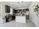 Open kitchen featuring granite countertops and stainless steel appliances at 978 E 10Th St, Apopka, FL 32703